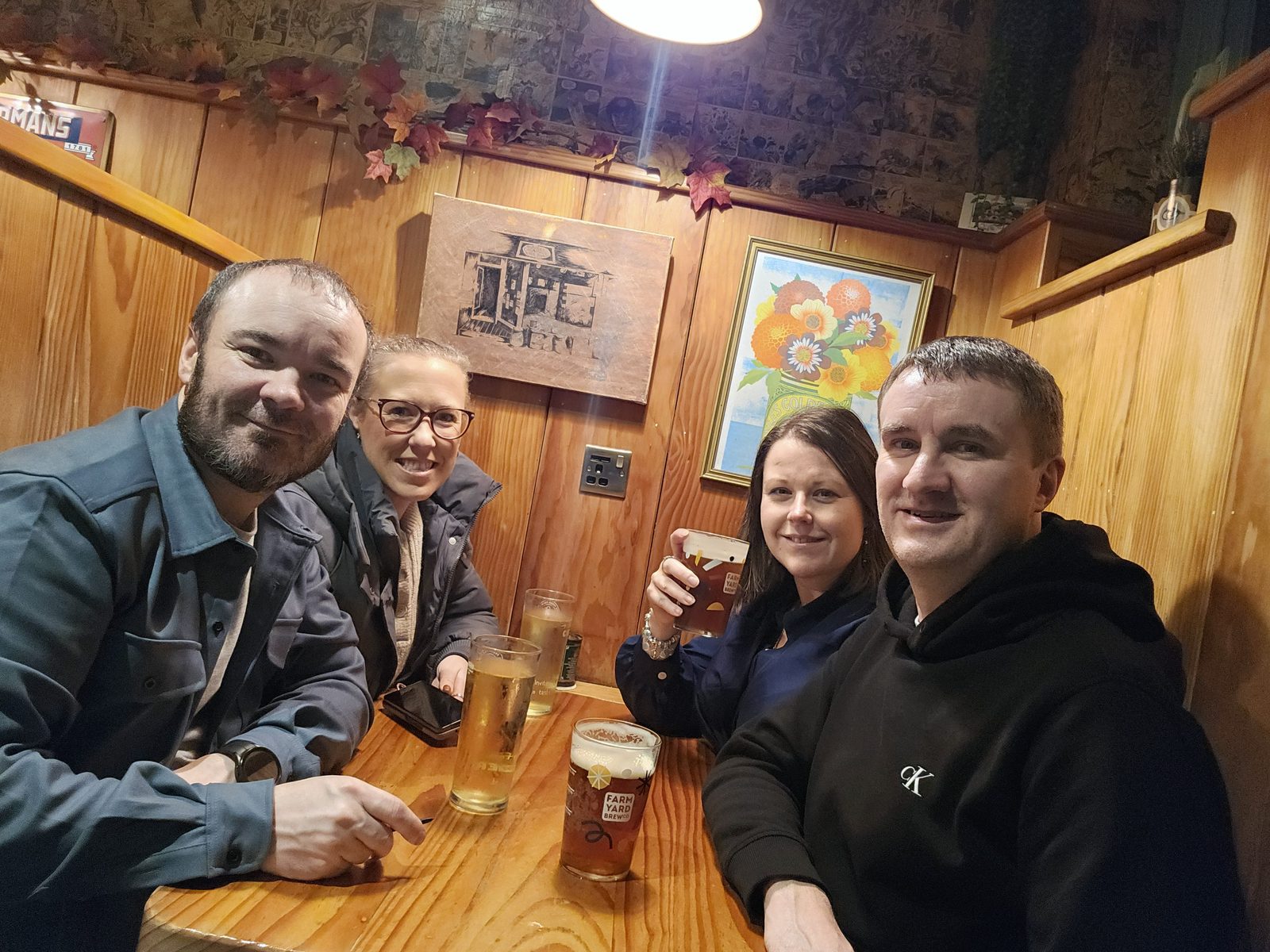 The four of us round a pub table on last year's December trip